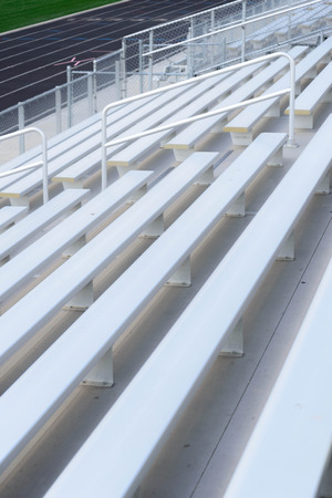 outdoor black running track with painted lane lines from the bleachersの写真素材