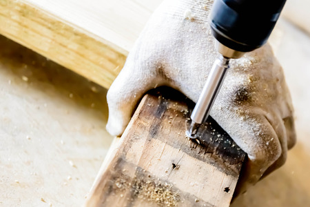 hand and tools doing wood work construction projectの写真素材