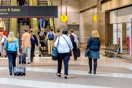 DIA, DEN, Denver International Airport, CO - People waiting for the terminal tram at DIAのeditorial素材