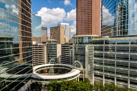 Downtown Houston highrise buildings with a blue sky