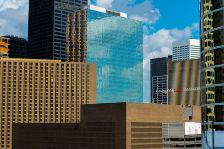 Downtown Houston highrise buildings with a blue skyの写真素材
