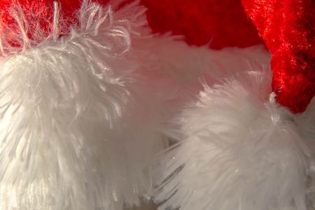 Christmas decorations, red nad white santa hats with flufffy ballの写真素材