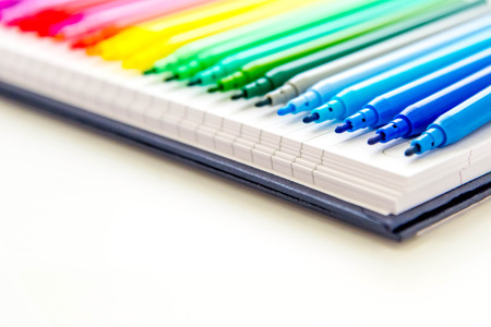 line of multi colored markersの写真素材