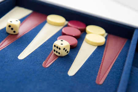 board games - red white and blue backgammon set in playの写真素材