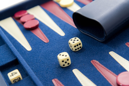 board games - red white and blue backgammon set in playの写真素材