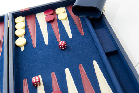 board games - red white and blue backgammon set in playの写真素材