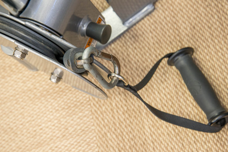 Indoor exercise equipment - hand grips close-up on textured floor