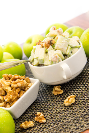green apple and walnut salad with condensed milkの写真素材