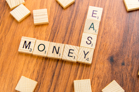 word board tiles spelling  EASY MONEYのeditorial素材
