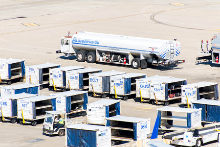 IAH, Houston Intercontinental Airport, Houston, TX, USA - luggage carts on the active ramp at IAH airportのeditorial素材