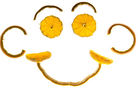 smiley face made with orange slices with backlightingの写真素材