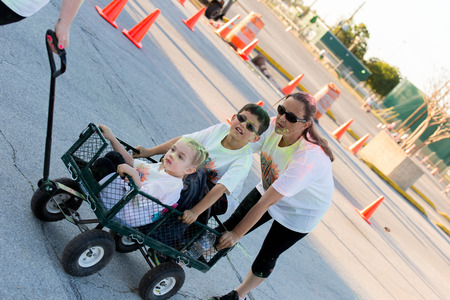 November 1, 2014 - Houston, TX, USA: Color Fun Fest 5K run. Runners completing the course with colored powderのeditorial素材