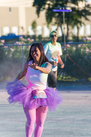 November 1, 2014 - Houston, TX, USA: Color Fun Fest 5K run. Runners completing the course with colored powderのeditorial素材