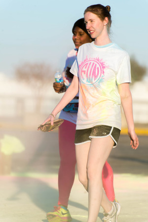 November 1, 2014 - Houston, TX, USA: Color Fun Fest 5K run. Runners completing the course with...