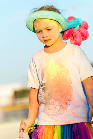 November 1, 2014 - Houston, TX, USA: Color Fun Fest 5K run. Runners completing the course with colored powderのeditorial素材