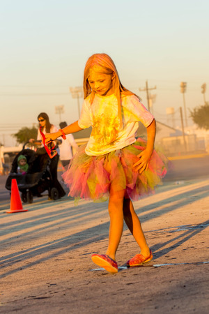 November 1, 2014 - Houston, TX, USA: Color Fun Fest 5K run. Runners completing the course with colored powderのeditorial素材