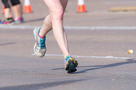 January 18, 2015 - Houston, TX, USA: Houston 2015 Marathon runners on Memorial Drive after passing mile 22のeditorial素材