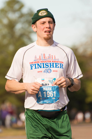 January 18, 2015 - Houston, TX, USA: Houston 2015 Marathon runners on Memorial Drive after passing mile 22のeditorial素材