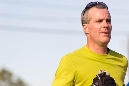 January 18, 2015 - Houston, TX, USA: Houston 2015 Marathon runners on Memorial Drive after passing mile 22のeditorial素材