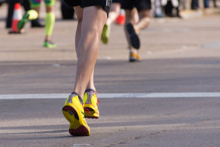 January 18, 2015 - Houston, TX, USA: Houston 2015 Marathon runners on Memorial Drive after passing mile 22のeditorial素材