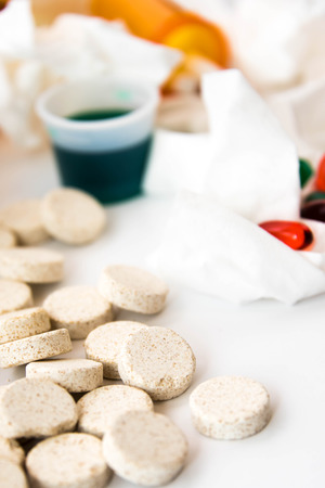 cold and flu season medicines for cough, sneeze, and sore throatの写真素材