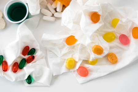 cold and flu season medicines for cough, sneeze, and sore throatの写真素材