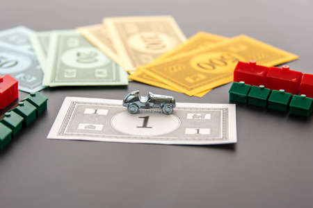 February 8, 2015 - Houston, TX, USA.  Monopoly car, money, hotels and housesのeditorial素材