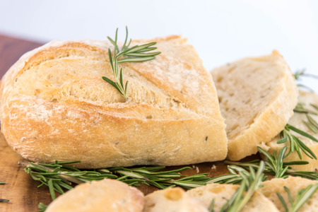 a fresh baked loaf of rosemary breadの写真素材