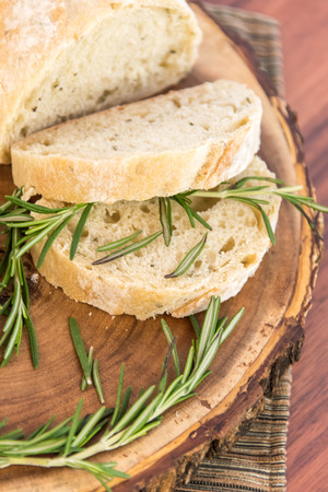 a fresh baked loaf of rosemary breadの写真素材