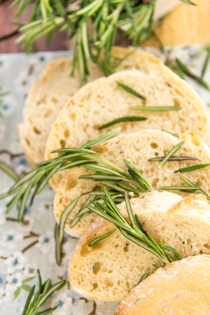 a fresh baked loaf of rosemary breadの写真素材