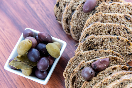 fresh baked olive bread and olives