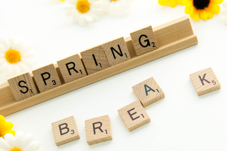 December 19, 2014: Houston, TX, USA - Scrabble word game wood tiles spelling Spring Breakのeditorial素材