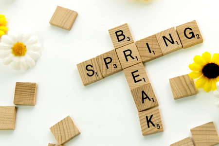 December 19, 2014: Houston, TX, USA - Scrabble word game wood tiles spelling Spring Breakのeditorial素材