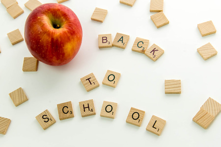 December 19, 2014: Houston, TX, USA - Scrabble word game wood tiles spelling Back To Schoolのeditorial素材