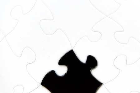 black and white puzzle pieces contrastingの写真素材