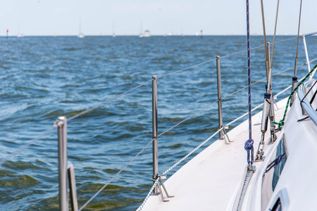 sailing a yacht in the open oceanの写真素材