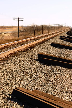 power poles along railroad tracks