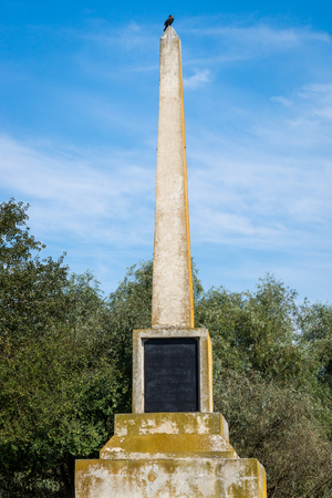Obelisk in Danube Delta, Crisan village, Romania. This column was raised in May 1894 in honor of His Majesty Charles I, king of Romania, during the inauguration of improvement works of the European Commission of the Danube.の写真素材
