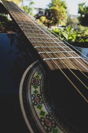 wooden fingerboard viewed from the side, guitar neck from the sideの写真素材