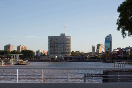 puerto maderos, argentina, sunset shadows and lights, warm sun, winterの写真素材