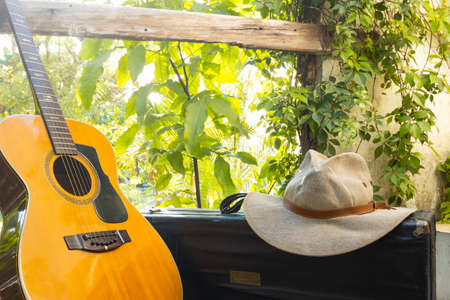 music on wood guitar and saxophone with blues country and jazz hat, vintageの写真素材