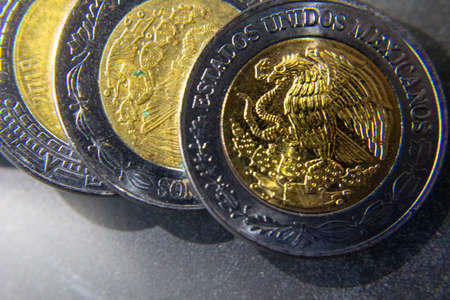 mexican money, bills and coins, save to buy, investments in mexico, devaluation of the peso, many...