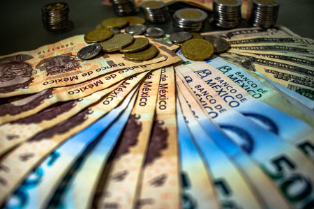 mexican money, bills and coins, save to buy, investments in mexico, devaluation of the peso, many...