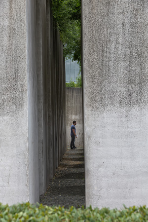 July 2015 - The Jewish Museum Berlin, Berlin, Germany: The Garden of Exile and Emigration.The 49th column, filled with earth from Jerusalem, stands for Berlin. The whole garden is on a 12ÃÂ° gradient and disorients visitors.のeditorial素材