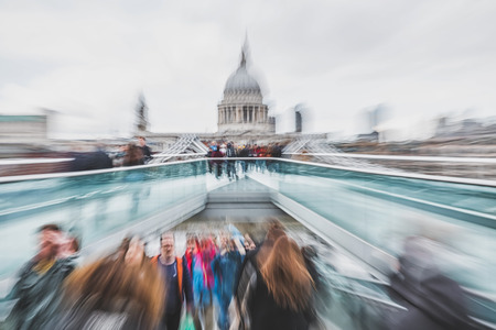 April 2016 - London, England:  Blurred photo of people crossing Millenium Footbridgeの写真素材