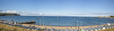 Swanage, Dorset, UK - July 2016. A panorama view of Swanage bay looking towards Bournemouth and Old Harry rock at Swanage in Dorset, UKのeditorial素材