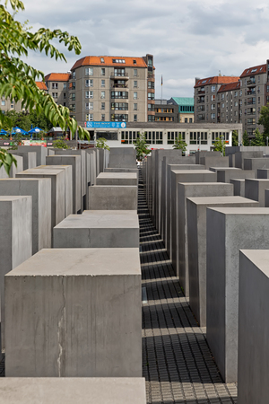 BERLIN, GERMANY - JULY 2015:  View of famous Jewish Holocaust Memorial near Brandenburg Gate in summer on July 27, 2015 in Berlin Mitte, Germanyのeditorial素材