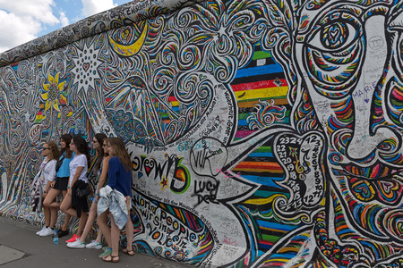BERLIN, GERMANY - JULY 2015: Berlin Wall graffiti seen on