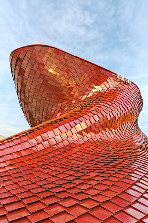 MILAN, ITALY - September 2015: : Architectural view of Vanke Pavilion at World Expo 2015 in Milan, realized with red ceramic. Pavilion designed by Daniel Libeskind Studioのeditorial素材