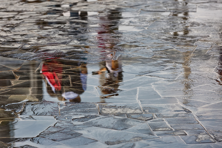 Abstract Reflections of a Boy in a Puddleの写真素材